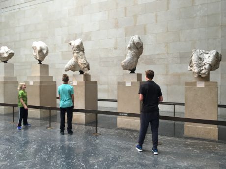 The boys, admiring some of the Elgin Marbles, in the British Museum.
