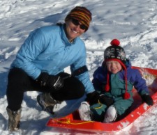 Sledding with our youngest son, 2-year-old Finis.