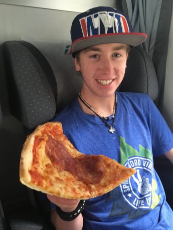 A piece of pizza from Italy and our oldest son, Wolf. (Or, can we get a little Wolf with that pizza?)