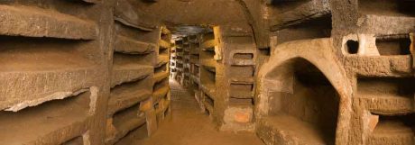 A glimpse into the Catacombs of Priscilla. (Photo borrowed from CatacombePriscilla.com)