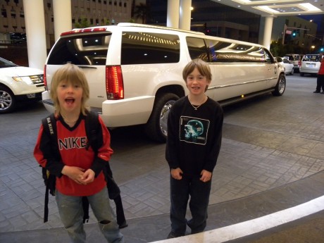 Hayden and Wolfie posing in front of some famous person's ride. (Every time they saw a stretch they were certain it was Miley Cyrus or Zac Efron!)
