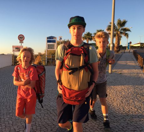 On the move. The boys walking to the bus station in Lagos.