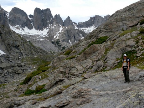 Kathy on Jackass Pass, with the prize--the Cirque of the Towers--showing themselves.