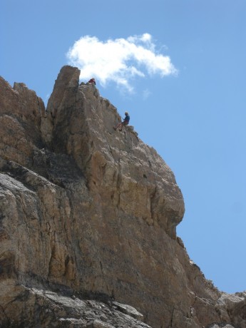 Jamie starts his first rappel.