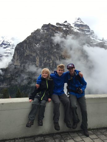 Our boys, sitting in front of Jungfrau in Mürren.