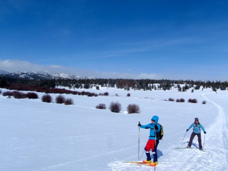 My good friends, Holly Copeland and Kathy Browning, ski along the Continental Divide Snowmobile Trail. (It wasn't easy.)