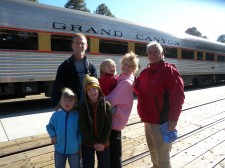 Jerry, the kids and parents wait board the return train.